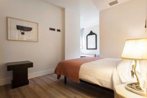 Posteľ alebo postele v izbe v ubytovaní Apartamentos RG Dúplex San Bernardo