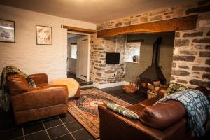 Posezení v ubytování Treberfedd Farm Cottages and Cabins