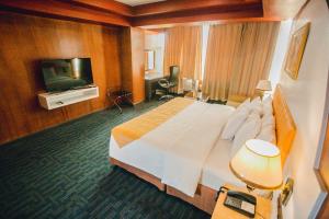 TV a/nebo společenská místnost v ubytování Butuan Grand Palace Hotel