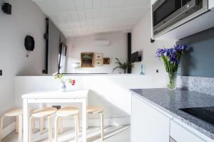 Kuchyňa alebo kuchynka v ubytovaní Apartamentos RG Dúplex San Bernardo