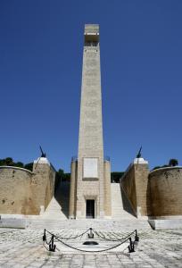 a tall tower in the middle of a building at L'atmosfera in Brindisi