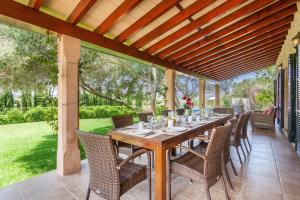A garden outside Owl Booking Villa Siquier - Luxury Retreat with Mountain Views
