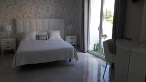 Posteľ alebo postele v izbe v ubytovaní Hotel Villaclara