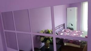 Postel nebo postele na pokoji v ubytování Petaluda House 1