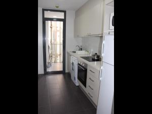 Kuchyňa alebo kuchynka v ubytovaní Apartment Sofi