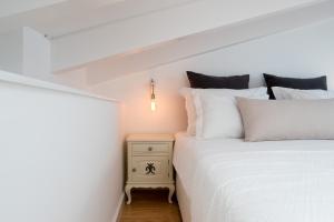 Cama ou camas em um quarto em Lugares Com História