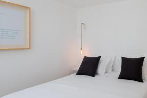 Cama ou camas em um quarto em Lugares Com História