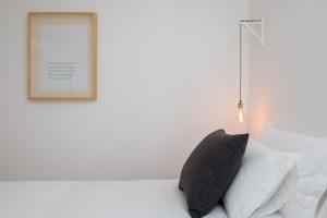 Cama ou camas em um quarto em Lugares Com História