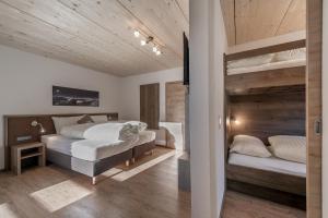 Postel nebo postele na pokoji v ubytování Berghotel & Gasthof Marlstein