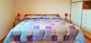 מיטה או מיטות בחדר ב-Villa Pietrina del Mejlogu