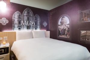 Katil atau katil-katil dalam bilik di Morwing Hotel - Culture Vogue