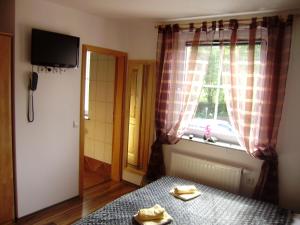 Postel nebo postele na pokoji v ubytování Guest House Čater
