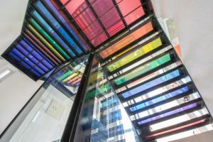 a group of colored glass stacked on top of each other at Color Coral Boutique Hotel in Magong