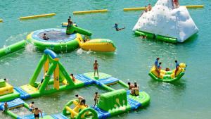 a group of people playing in the water at a water park at Sunny apartment in Athens