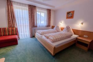 Postel nebo postele na pokoji v ubytování Ferienhaus Grubhof