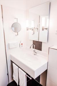 Bathroom sa Hotel Martinihof