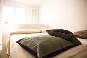 Postel nebo postele na pokoji v ubytování Hotel Cervetta 5