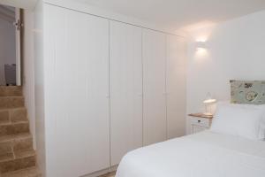 Cama ou camas em um quarto em Lugares Com História mais 37 fotos