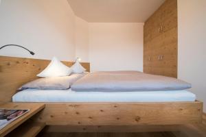 Cama ou camas em um quarto em Vettererhof