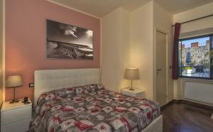 Posteľ alebo postele v izbe v ubytovaní Hotel Il Giardino