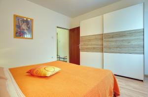 Postel nebo postele na pokoji v ubytování Apartments Danilo