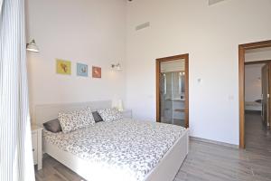 Postel nebo postele na pokoji v ubytování Villa Sion