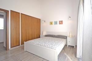 Postel nebo postele na pokoji v ubytování Villa Sion