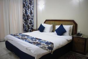 Giường trong phòng chung tại AIFU Hotel El Montazah Alexandria