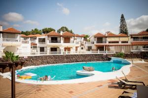 Bazén v ubytování New! Sea View Apartment with Aircon in Center of Las Americas nebo v jeho okolí