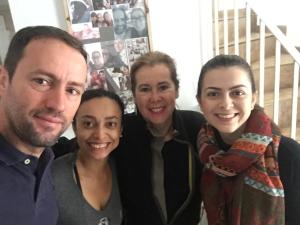 a group of three people posing for a picture at Pousada Family Consulado Americano in São Paulo