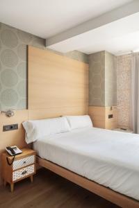 Postel nebo postele na pokoji v ubytování Hotel Atalaia