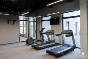 Posilňovňa alebo fitness centrum v ubytovaní Jantar Apartamenty Exclusive Polanki Park SPA