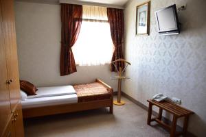 Μια τηλεόραση ή/και κέντρο ψυχαγωγίας στο Garni Hotel Lav