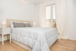 Katil atau katil-katil dalam bilik di BNBHolder Luxury Apartment III PLAZA DE ESPAÑA