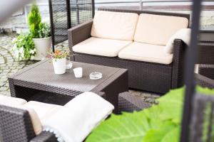 Khu vực ghế ngồi tại Unitas Hotel