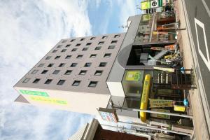 
a large building with a lot of windows at Hotel Select Inn Nagano in Nagano
