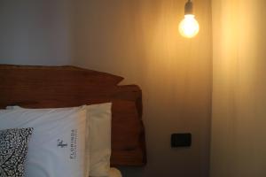 Cama ou camas em um quarto em Hotel Florinda