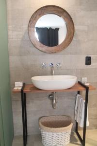 Um banheiro em Hotel Florinda