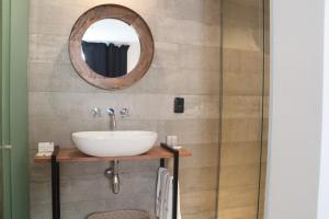 Um banheiro em Hotel Florinda
