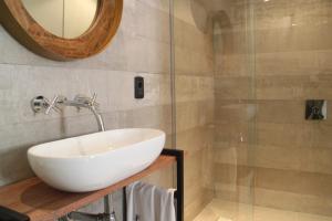 Um banheiro em Hotel Florinda