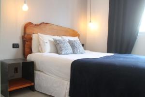 Cama ou camas em um quarto em Hotel Florinda