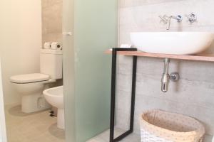 Um banheiro em Hotel Florinda