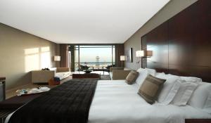 Llit o llits en una habitació de Hotel Miramar Barcelona GL