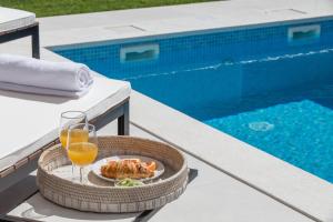 The swimming pool at or close to Koras Villa - villa with heated pool