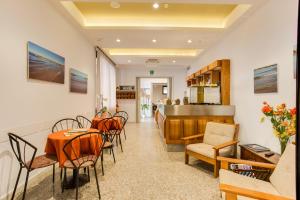 Posezení v ubytování Hotel Villa dei Gerani