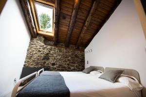 Ένα ή περισσότερα κρεβάτια σε δωμάτιο στο Mountain Hostel Tarter
