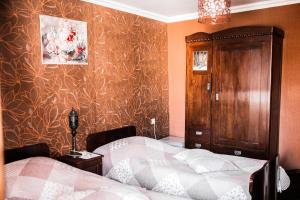 Postel nebo postele na pokoji v ubytování Casa de Khasia