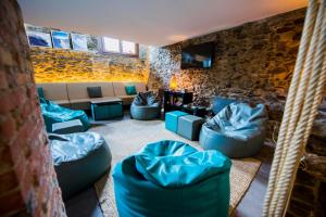 Χώρος καθιστικού στο Mountain Hostel Tarter