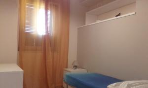 A bed or beds in a room at B&B la Palma