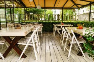 A restaurant or other place to eat at Milano Hotel